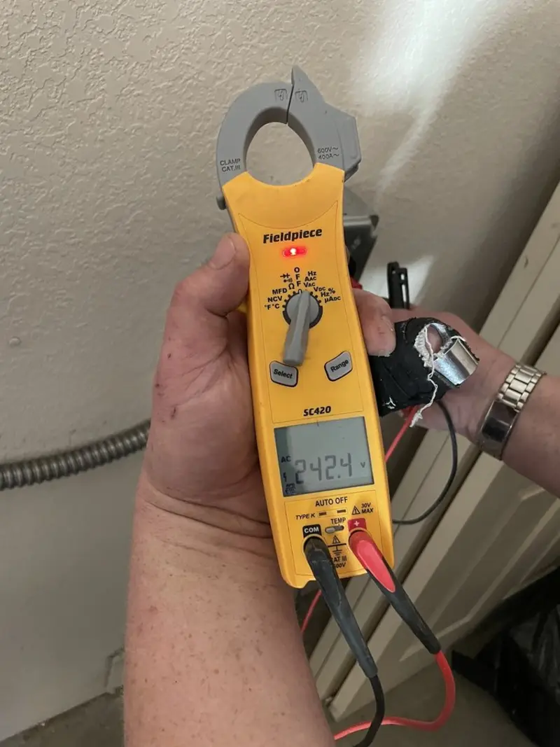 Voltage testing with clamp meter during Circuit Breaker Repair in Vandalia